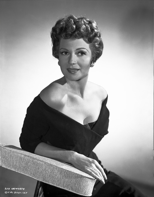 Rita Hayworth Leaning and Looking Side Ways Posed Photo Print - Item # VARCEL698309