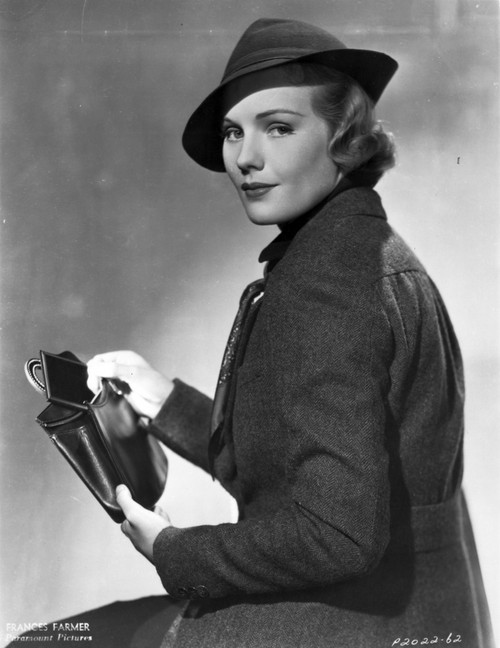 A portrait of Frances Farmer with a leather handbag Photo Print - Item # VARCEL698354