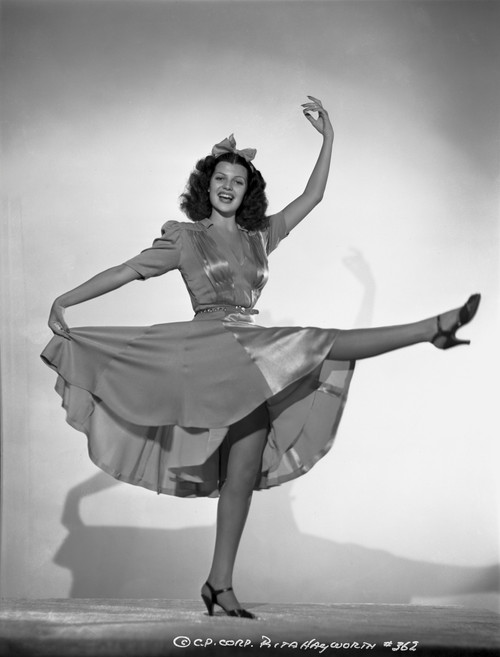 Rita Hayworth in Dancing Pose with Skirt and Heels Photo Print - Item # VARCEL698393