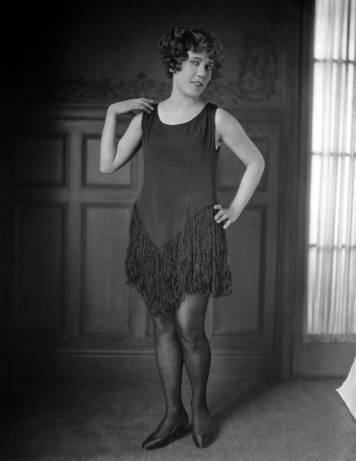 Louise Fazedna on Black Cocktail Dress One Hand on Waist Photo Print - Item # VARCEL698445