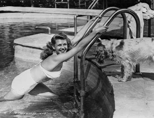 Portrait of Rita Hayworth posed with Swimwear in the Swimming Pool Photo Print - Item # VARCEL698477