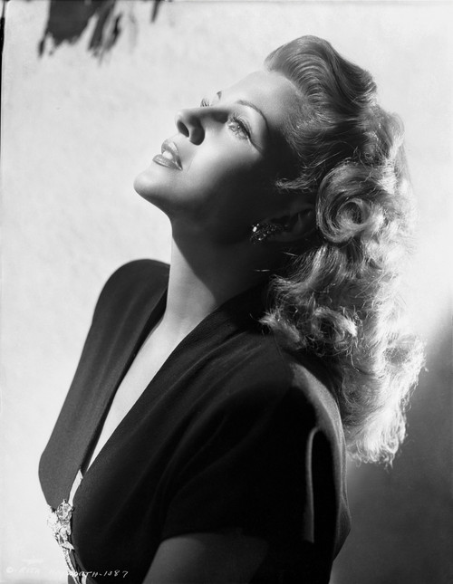 Rita Hayworth Looking Up in a Side View Pose Photo Print - Item # VARCEL698468