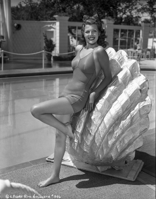 Rita Hayworth Swim suit Attire with a smiling Pose Photo Print - Item # VARCEL698471