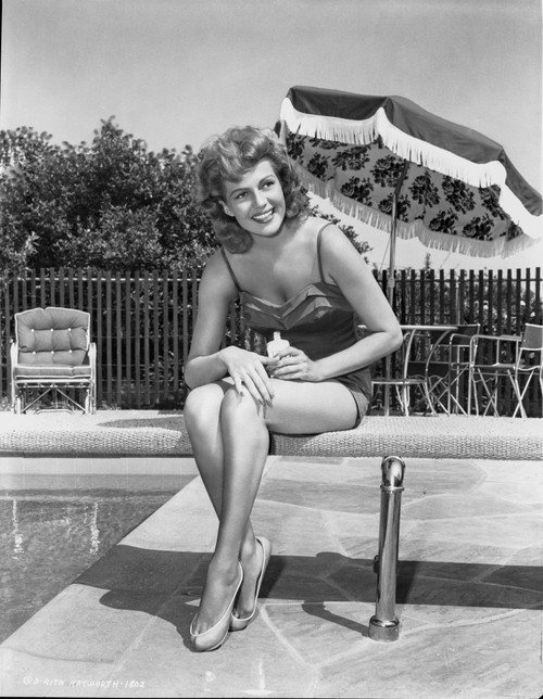 Rita Hayworth posed with in Black and White Photo Print - Item # VARCEL698582