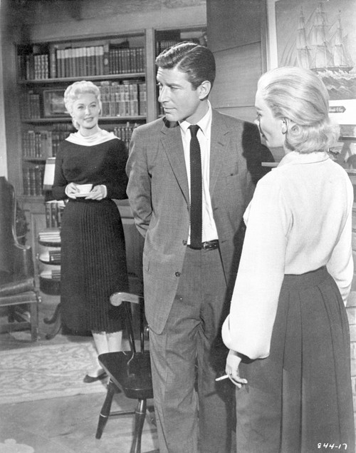 Home Before Dark Man in Suit Talking to Two Ladies Photo Print - Item # VARCEL698562