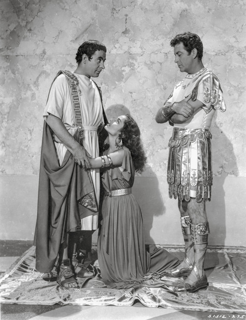Quo Vadis Woman Begging in Between Two Men Scene Excerpt from Film in Black and White Photo Print - Item # VARCEL698589