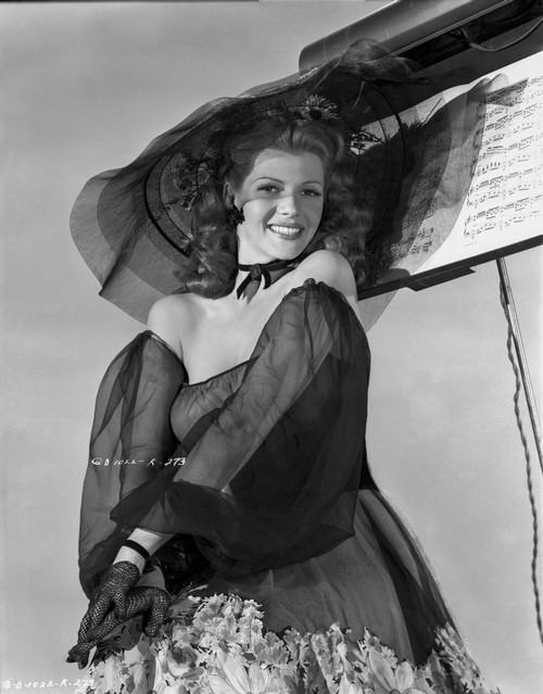 Rita Hayworth Pose in Black Dress and Hat Photo Print - Item # VARCEL698625