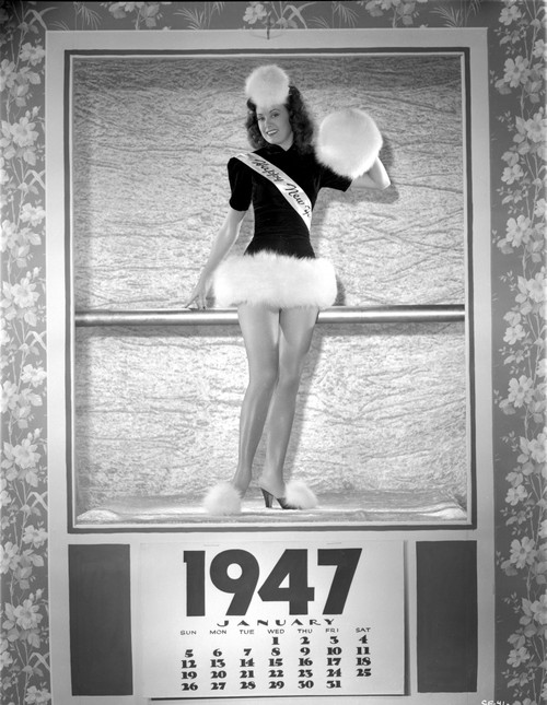 Carol Forman wearing a Furry Head Dress and Shoes Portrait on a Calendar Photo Print