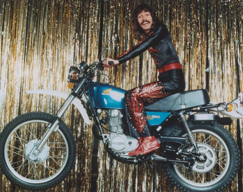 Portrait Doug Henning Riding a Motorbike Photo Print - Item # VARCEL698728