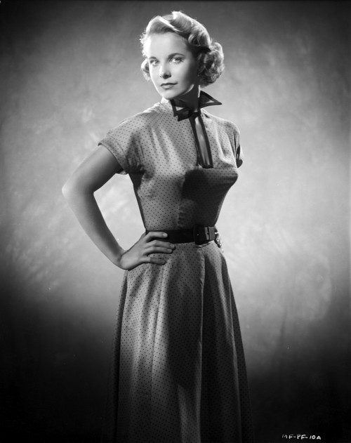 Mona Freeman on a Printed Dress with Hands on Waist Portrait Photo Print - Item # VARCEL698758