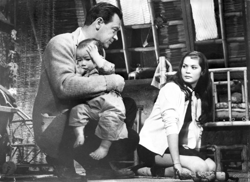 World Of Suzie Man and Woman Talking in Movie Scene with Child Photo Print - Item # VARCEL698756