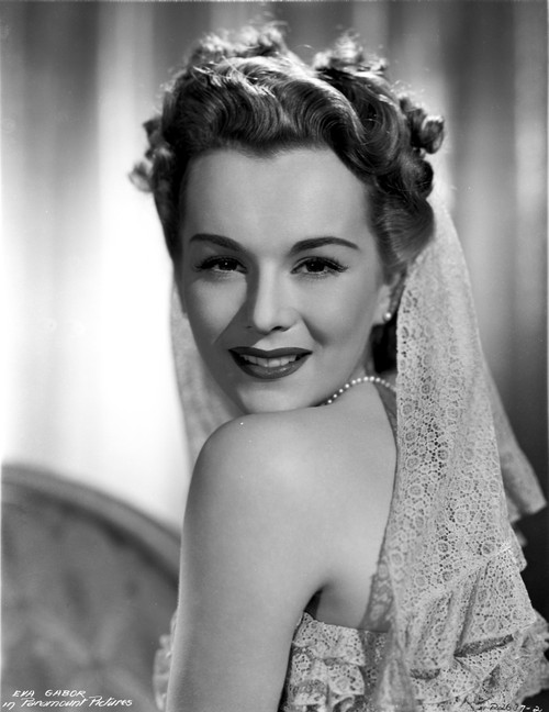 Eva Gabor on a Lace Bridal Gown Photo Print - Item # VARCEL698823