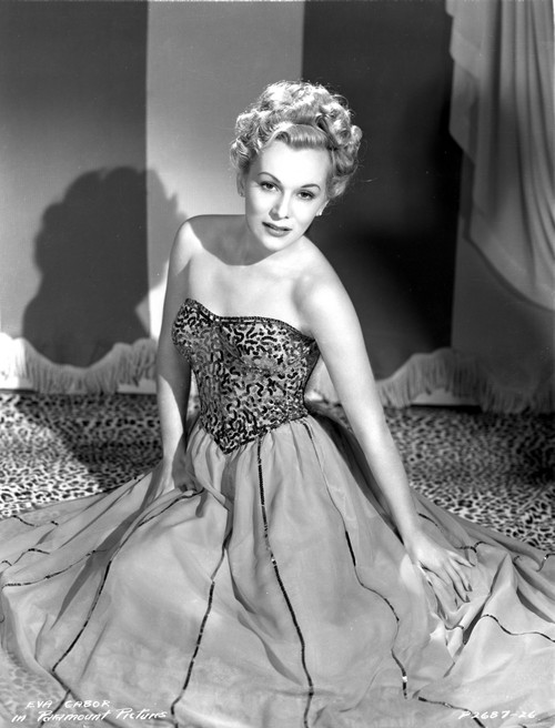 Eva Gabor on a Embroidered Top sitting on the Floor Photo Print - Item # VARCEL698853