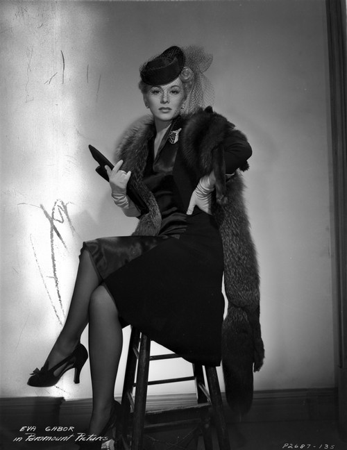 Eva Gabor on a Furry Shawl and Dark Dress sitting Photo Print - Item # VARCEL698832