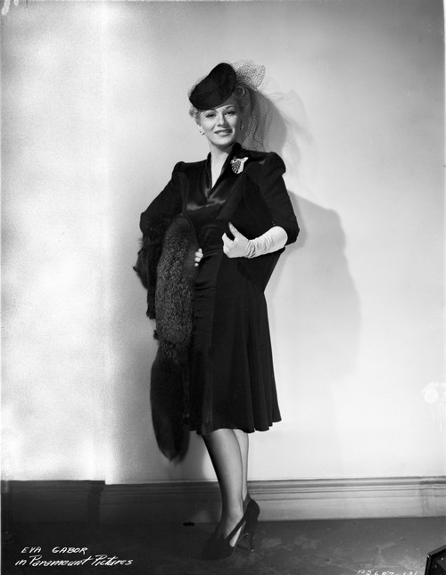 Eva Gabor on Dark Dress Leaning on Wall Portrait Photo Print - Item # VARCEL698865