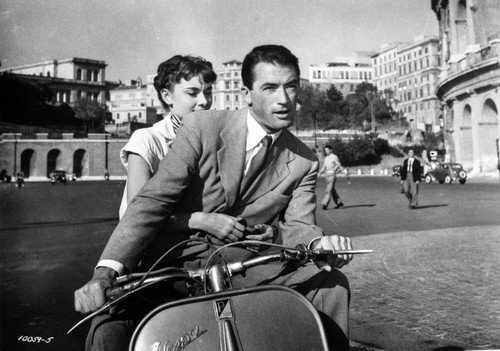 Audrey Hepburn and Gregory Peck in Rome Riding a Motorcycle Photo Print - Item # VARCEL698866
