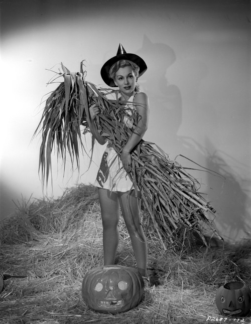 Eva Gabor on a Dress Carrying Dried Leaves and Twigs Photo Print - Item # VARCEL698885