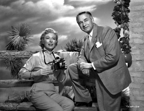 Greer Garson on a Silk Top Holding a Camera Portrait Photo Print - Item # VARCEL698926