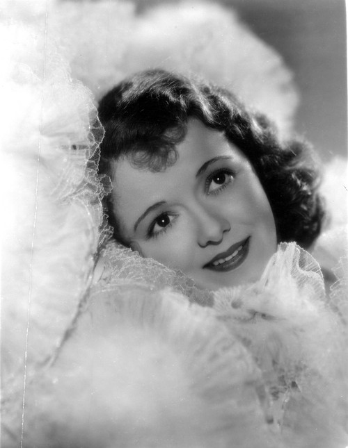 Janet Gaynor Surrounded with Fluffy Lace Portrait Photo Print - Item # VARCEL698996