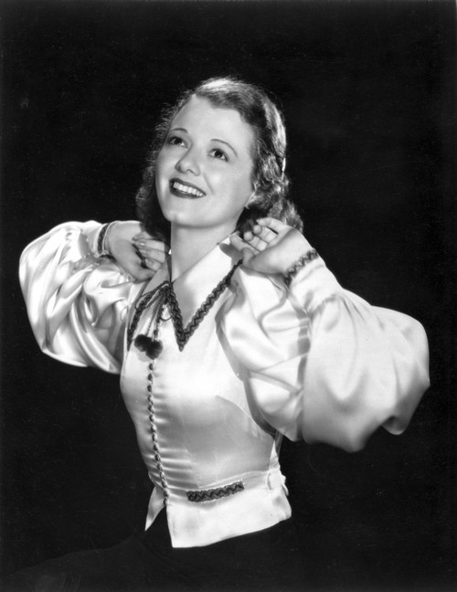 Janet Gaynor on a Silk Long Sleeve Looking Up Portrait Photo Print - Item # VARCEL699049