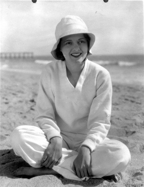 Janet Gaynor on a Long Sleeve Top sitting on a Beach Photo Print - Item # VARCEL699059