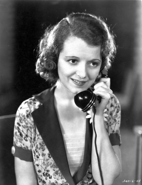 A portrait of Janet Gaynor talking on the telephone Photo Print - Item # VARCEL699065
