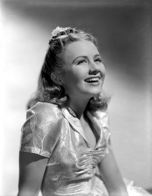 Ann Gillis wearing a Silk Top and smiling in Portrait Photo Print - Item # VARCEL699098
