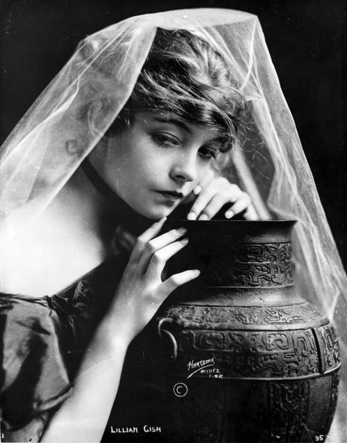 Lillian Gish on a Veil Leaning on a Vase Portrait Photo Print - Item # VARCEL699142