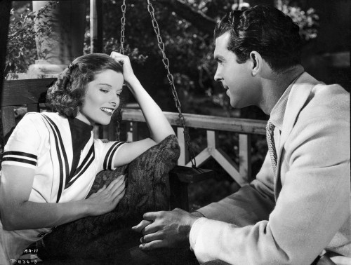 Katharine Hepburn with a Man Talking Movie Scene Photo Print - Item # VARCEL699150