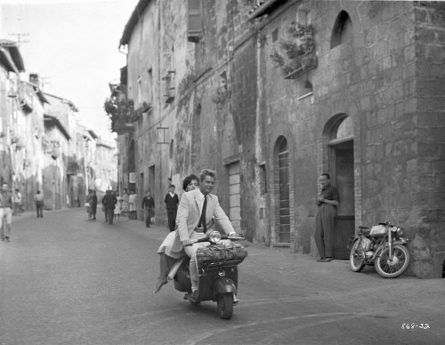 Rome Adventure Man in Suit Riding a Scooter with Woman Photo Print - Item # VARCEL699127