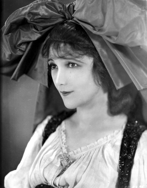 Jetta Goudal Portrait in White Pleated Blouse and Large Ribbon Headdress Photo Print - Item # VARCEL699247