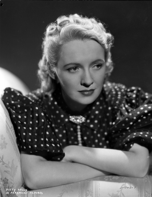 Kitty Kelly on Polka Dotted and Puffed Sleeve Leaning Portrait Photo Print - Item # VARCEL699256