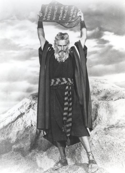 Charlton Heston Raising the Ten Commandments, wearing Red Dress with Slippers - A film still from The Ten Commandments Photo Print - Item # VARCEL699268