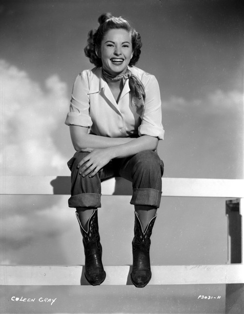 Colleen Gray on a Vintage Cowboy Attire sitting on Fence Photo Print - Item # VARCEL699338