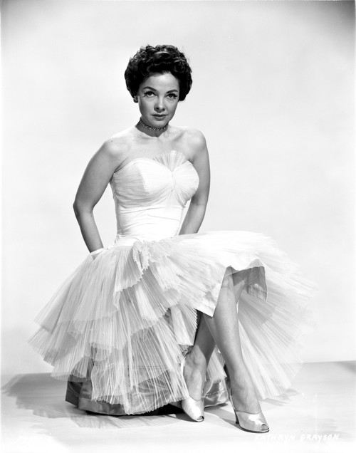 Kathryn Grayson on A Dress with Lace Skirt Sitting on A Chair Photo Print - Item # VARCEL699371