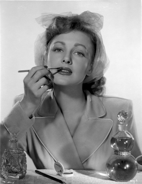 Virginia Grey Putting a lipstick on Lips Portrait Photo Print - Item # VARCEL699463