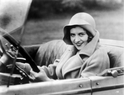 A portrait of Dorothy Gulliver driving a car Photo Print - Item # VARCEL699524
