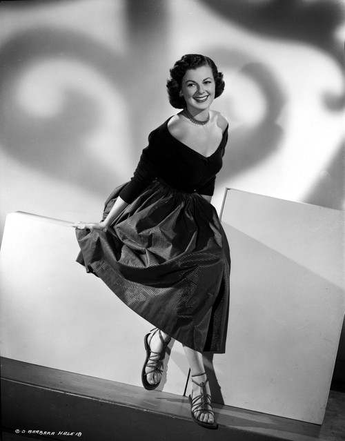 Barbara Hale on an Off-Shoulder Dress sitting and smiling Portrait Photo Print - Item # VARCEL699602