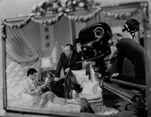 Hitchcock Alfred Filming a Man on Bed Photo Print - Item # VARCEL699645