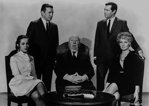 Hitchcock Alfred with Two Men standing and Two Ladies sitting Photo Print - Item # VARCEL699636