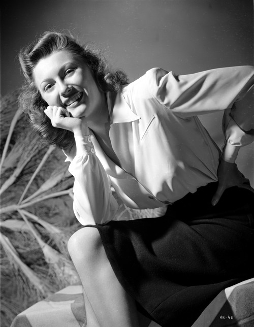 Anne Baxter on a Ruffled Dress smiling in Black and White Portrait Photo Print - Item # VARCEL699838