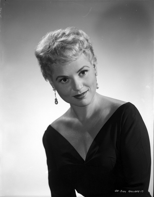 Judy Holliday wearing a V-Neck Dress and Earrings in a Portrait Photo Print - Item # VARCEL700038