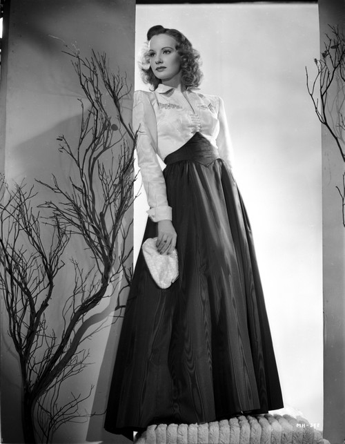 Martha Holliday on a Silk Long Sleeve Dress and Leaning on Wall Portrait Photo Print - Item # VARCEL700093