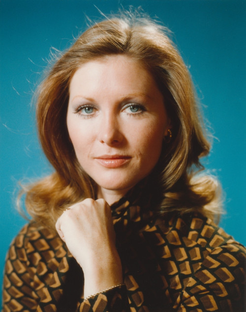 Susan Howard Posed in Blue Background Portrait wearing Printed Formal Coat Photo Print - Item # VARCEL700157