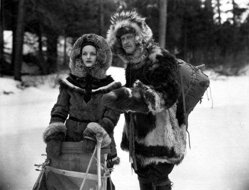 Rochelle Hudson and a man in the snow Photo Print - Item # VARCEL700233