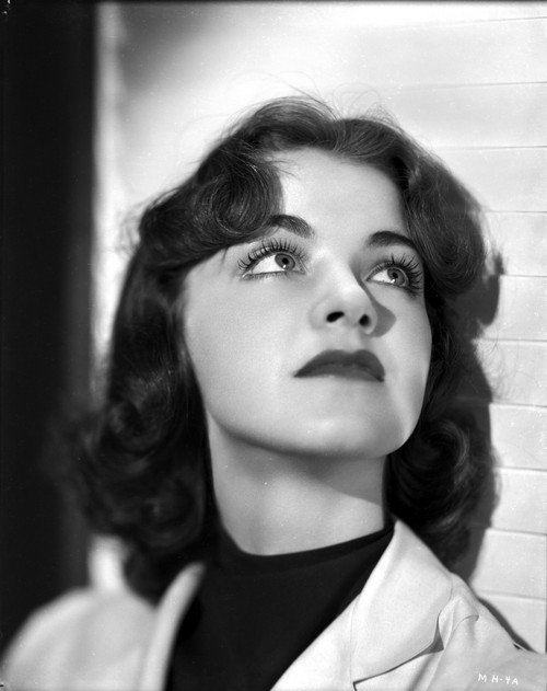 Marsha Hunt Looking Up and Leaning on a Wall Photo Print - Item # VARCEL700259