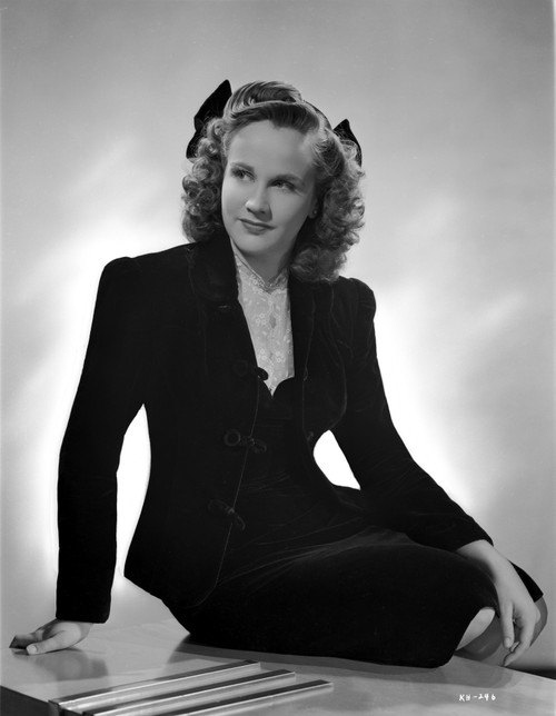 Kim Hunter on a Long Sleeve sitting on a Table Photo Print - Item # VARCEL700307