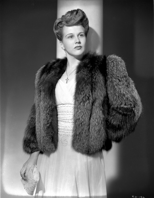 Kim Hunter on a Furry Coat and standing Portrait Photo Print - Item # VARCEL700313