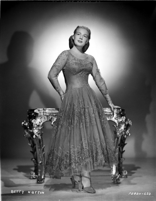 Betty Hutton on an Embroidered Lace and standing Photo Print - Item # VARCEL700422