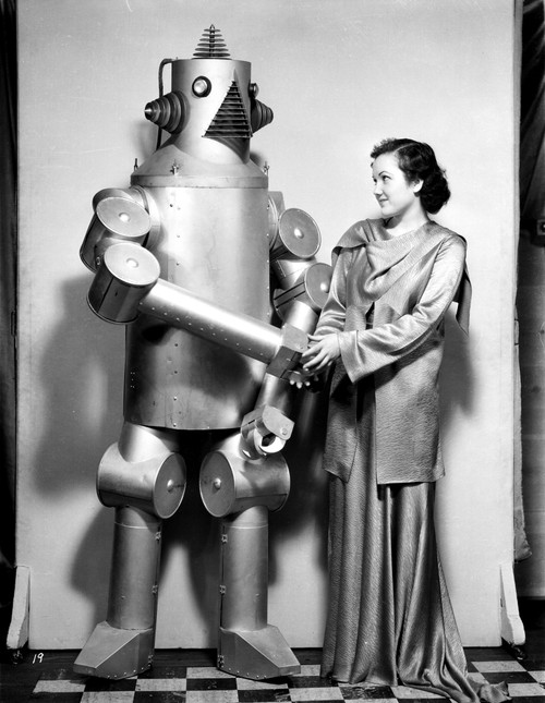 Lois January Handshaking with the Robot Photo Print - Item # VARCEL700504